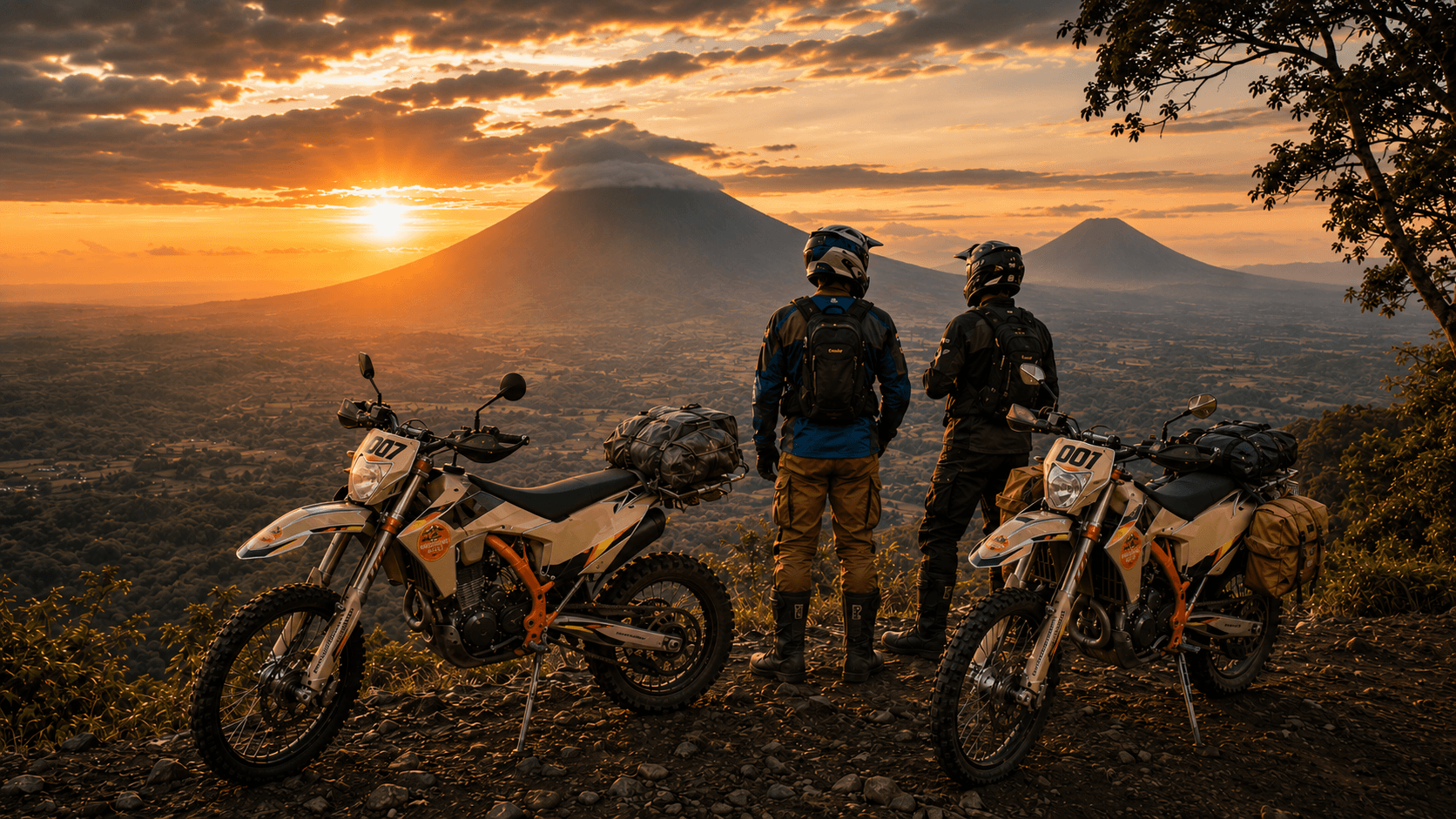 Rider on a KTM enduro bike crossing a volcanic ridge near Lake Atitlán, Guatemala
